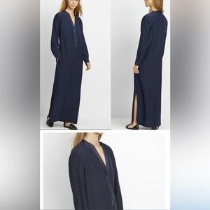 Silk Blue Vince dress with pockets and side slits with a drawstring.